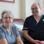 Thames Hospice's James Hill and patient