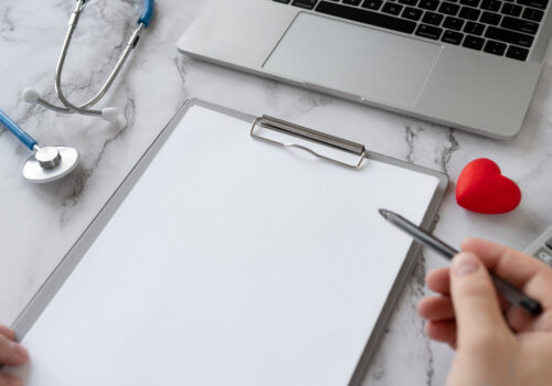 care planning - clipboard and items on desk