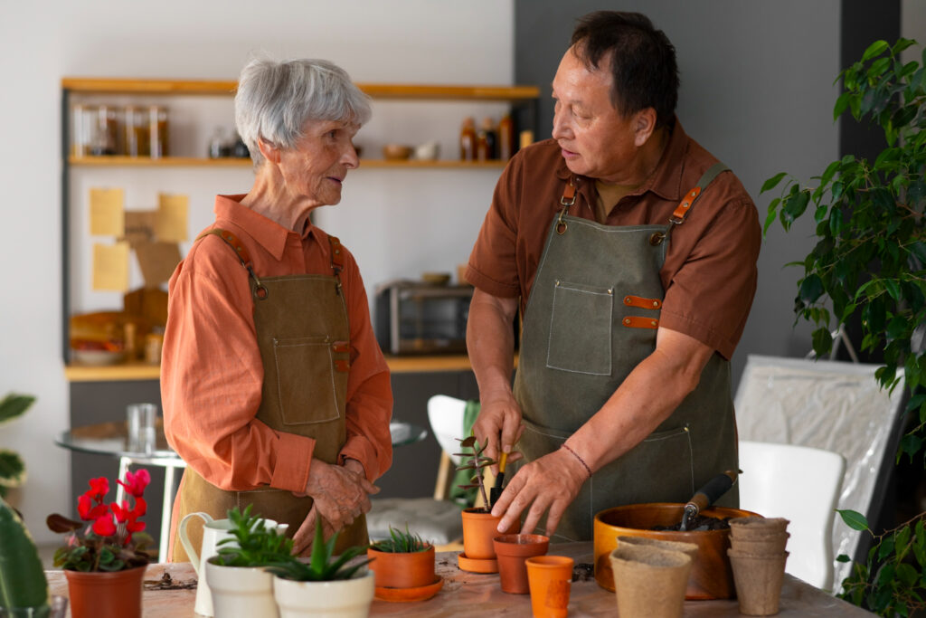 elderly lady and man gardening