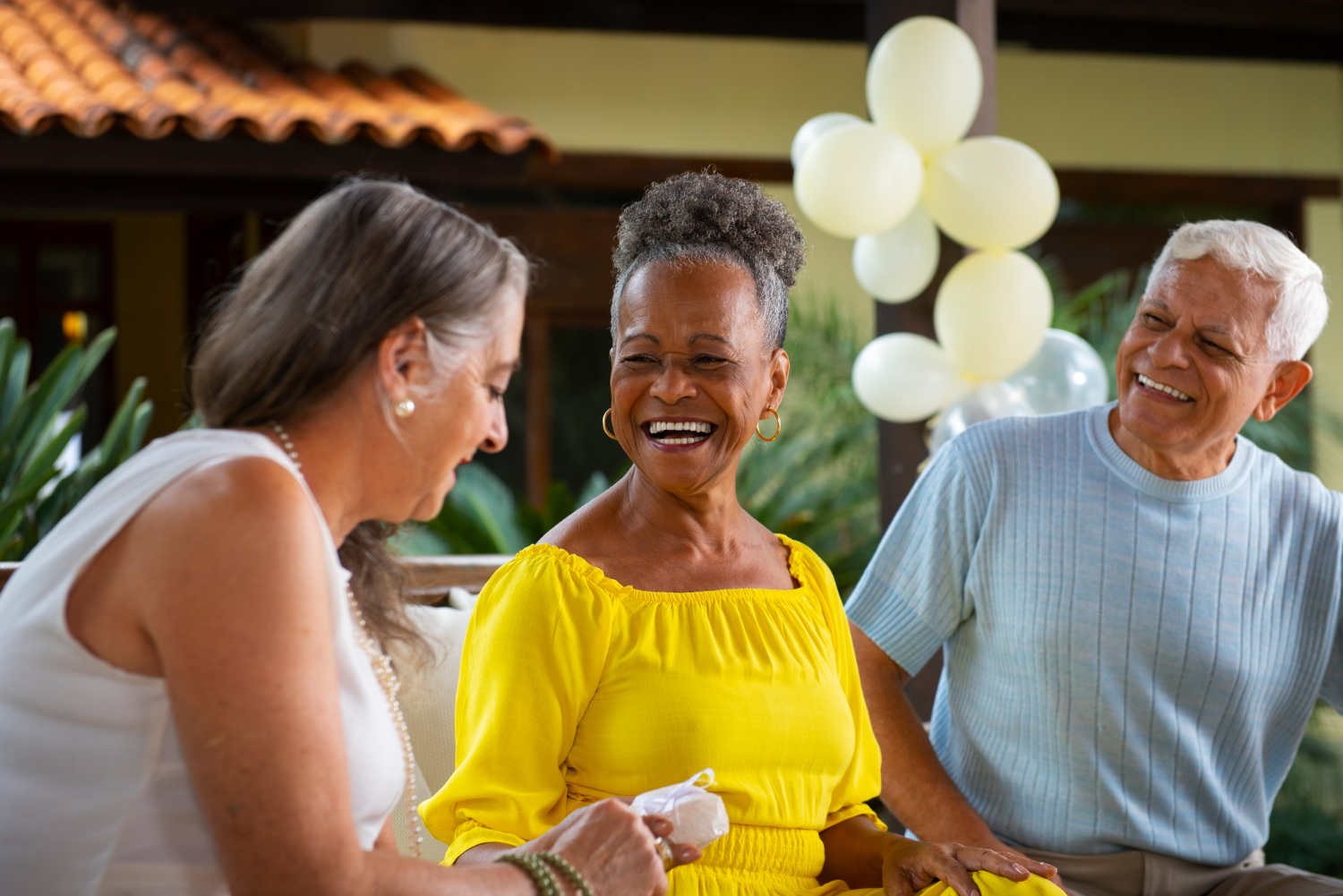 smiling elderly lady with friends