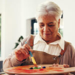 Older lady painting