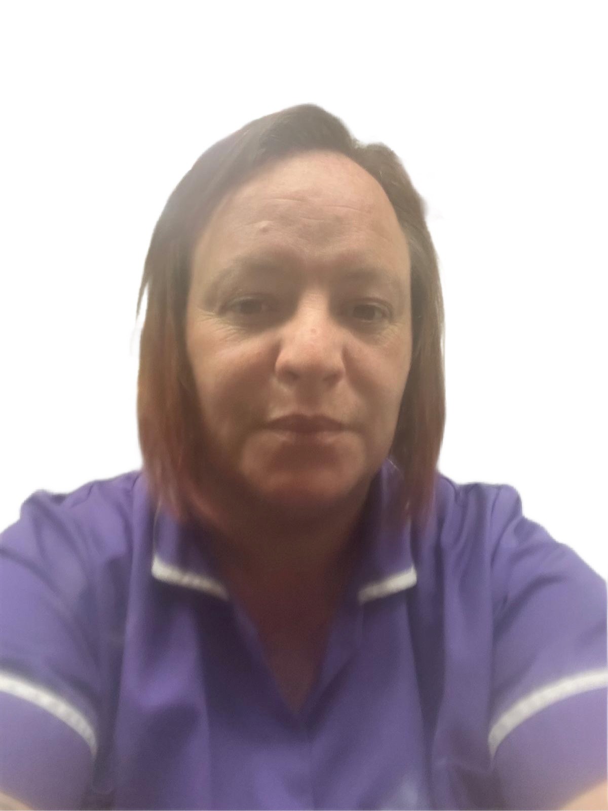 Image of Team Member from Astar Homecare Ltd Person wearing a purple collared shirt with white trim, facing the camera, against a plain white background.